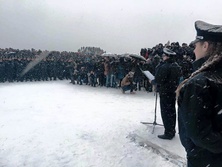 В Днепропетровске патрульные полицейские принимали присягу во время метели. Фоторепортаж