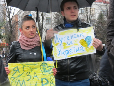В Луганске прошла акция "За мир и порядок". Фоторепортаж