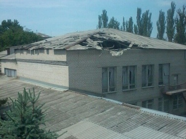 В Славянске обстреляли жилые дома и школу. Фоторепортаж