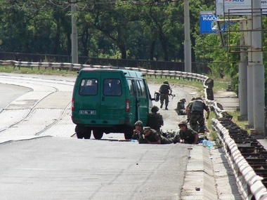В Мариуполе из гранатомета обстреляли пограничников, двое погибших. Фоторепортаж