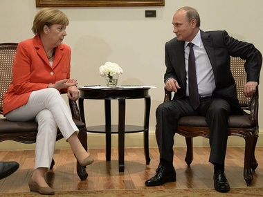 Путин и Меркель провели встречу в Бразилии