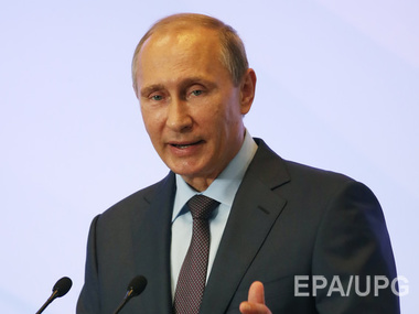Путин в Крыму назвал происходящее в Украине “кровавым хаосом”