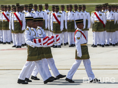 В Малайзию доставили тела погибших в крушении рейса MH17. Фоторепортаж