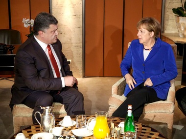 Порошенко и Меркель в Милане обсудили необходимость прекращения огня на востоке Украины