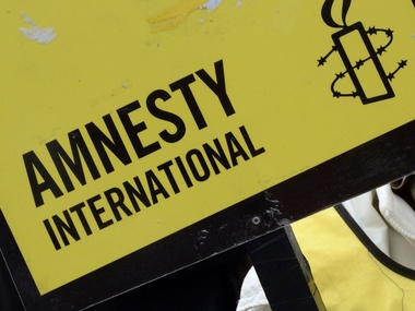 Amnesty International призвала расследовать смертоносный обстрел гражданского автобуса возле Волновахи