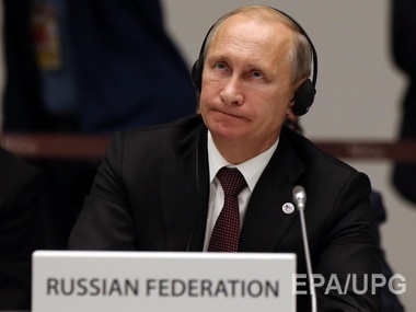 Путин утверждает, что получил "формальный ответ" от Порошенко на предложение отвести тяжелое вооружение