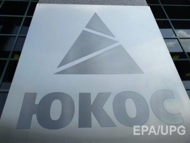 "Газпром" предупредил своих инвесторов о возможных исках бывших акционеров ЮКОСа