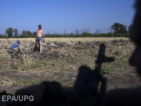 Пресс-центр АТО: Украинские военные завершили первый этап по отводу вооружения