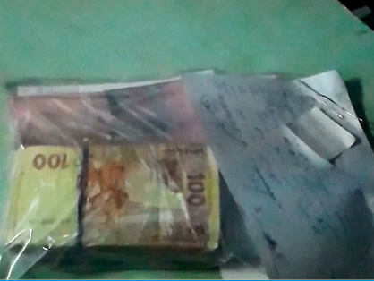 В Николаеве главе участковой комиссии принесли пакет с 30 тыс. грн, милиция выясняет, был ли подкуп