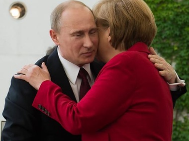 Путин, Меркель и Кэмерон выразили "крайнюю обеспокоенность" насилием в Киеве