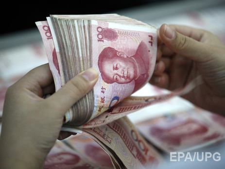 Центробанк Китая девальвировал юань до уровня июля 2011 года