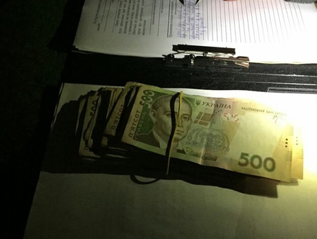 В Киеве офицер полиции задержан за получение взятки в 25 тыс. грн