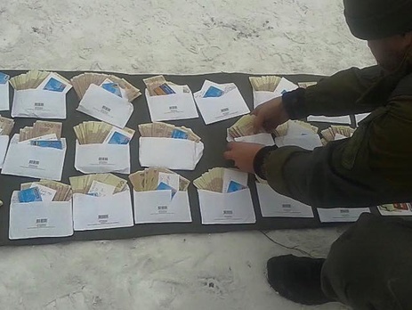 Волонтер Кожемяко: Разведка Нацгвардии задержала курьера, который вез на оккупированные территории сотни тысяч гривен