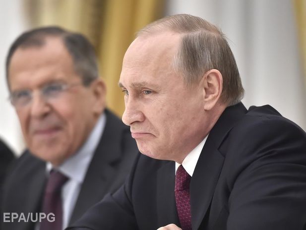 Путин рассказывает о борьбе с офшорами под аккомпанемент своего друга и 