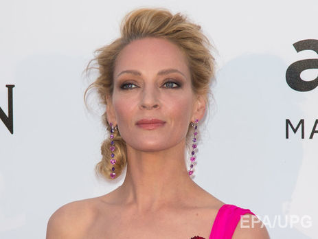 Турман продала страстный поцелуй за $196 тыс. 