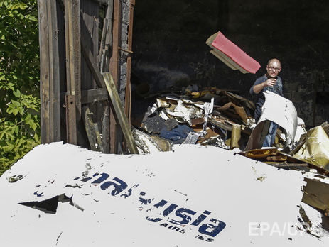 Рахманин: Путин знаком с содержанием доклада о гибели MH17 и предпринимает усилия, чтобы этот текст был выхолощен