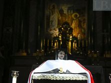 С белорусским, украинским и эстонским флагами. В Киеве попрощались с погибшим на Донбассе медиком. Фоторепортаж