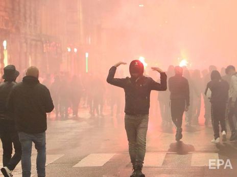 Протесты в Италии из-за жесткого карантина переросли в стычки с полицией. Фоторепортаж