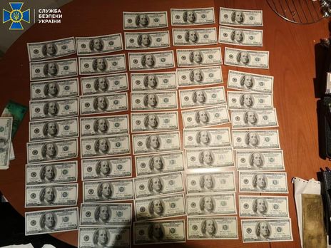Во время обысков у фигурантов нашли 25 тыс. фальшивых долларов