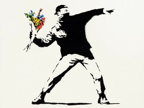 Бэнкси создал граффити Love Is In The Air в 2003 году