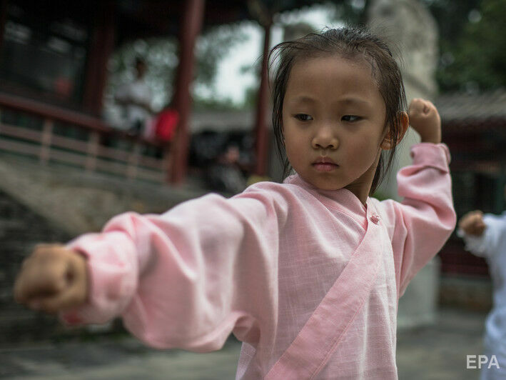 В Китае отменили штрафы за рождение трех детей в семье