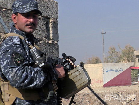 Иракский полицейский в освобожденном от ИГИЛ Хамам аль-Алиле
