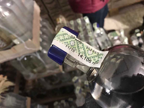 Под Киевом полиция изъяла 7,6 тонн фальсифицированного алкоголя