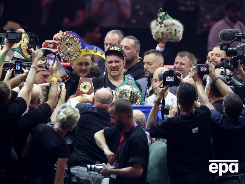 Усик победил Фьюри с нокдауном и стал абсолютным чемпионом мира. Лучшие моменты боя. Фоторепортаж