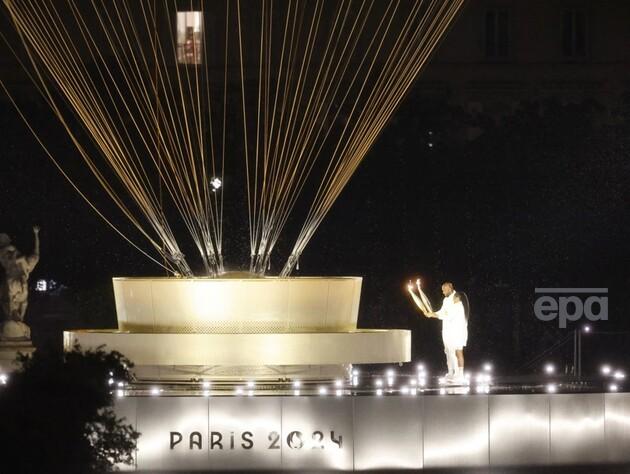 Лазерне шоу на Ейфелевій вежі, парад човнів на Сені і Олімпійський вогонь у повітряній кулі. В Парижі відкрились Олімпійські Ігри. Фоторепортаж