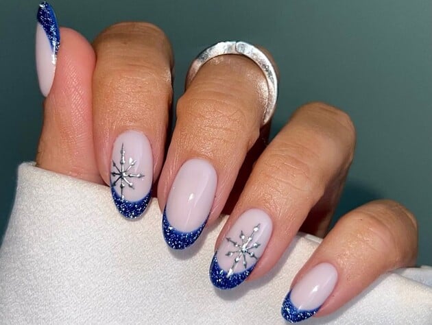 Розталі сніговики, нічний снігопад і класика. Найніжніші ідеї зимового манікюру для натхнення