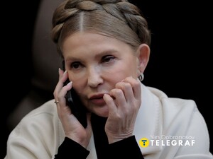 Юлія Тимошенко прийшла до суду в чорній масці. Фото