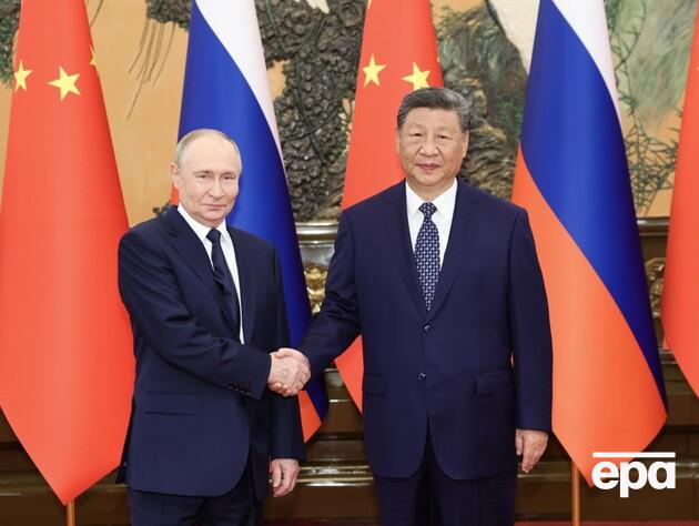 Під час переговорів в Абу-Дабі Путін зв'язався із Сі Цзіньпіном