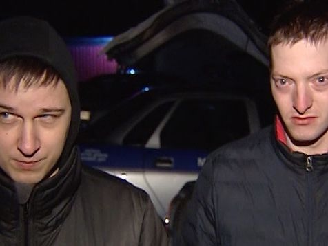 У Білорусі затримали двох озброєних росіян із прапором України