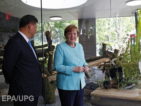 Си Цзиньпин и Меркель представили посетителям зоопарка в Берлине двух панд. Фоторепортаж