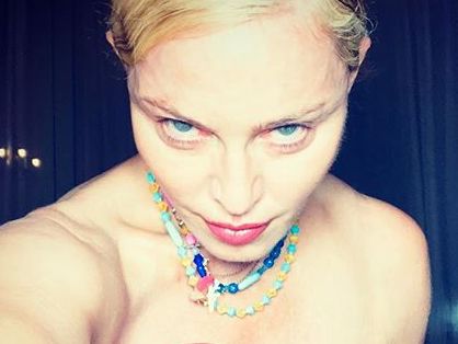 Полуобнаженные модели представили именную линию косметики Мадонны