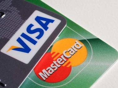 Visa и MasterCard остаются работать в России