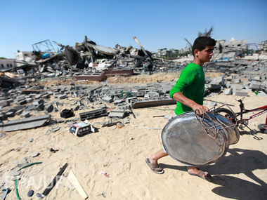 В результате израильско-палестинского конфликта погибло уже более 50 человек. Фоторепортаж
