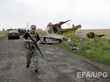 РИА "Новости": Боевики сбили еще один самолет в зоне катастрофы MH17