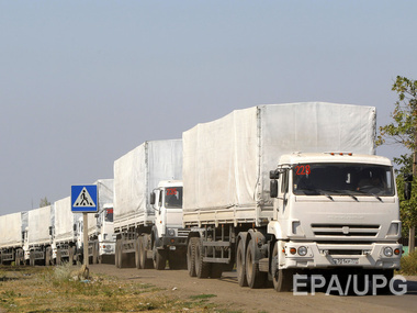 Bloomberg: Меркель приехала в Украину, российские грузовики возвращаются домой 