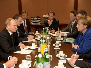 Меркель и Путин обсудили Украину в Милане