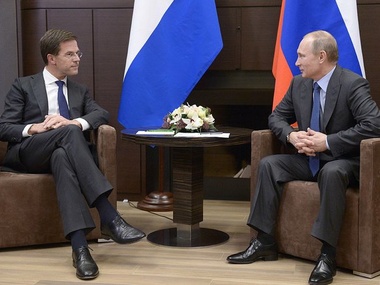 Марк Рютте и Владимир Путин во время встречи в Сочи 7 февраля 2014 года