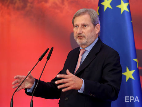 Еврокомиссар Хан призвал привлечь к ответственности виновных в нападениях на активистов в Украине