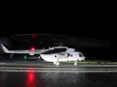 Украинские вертолетчики в Либерии провели тренировочный полет ночью. Фоторепортаж