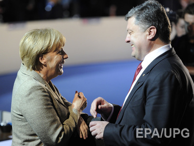 Порошенко обсудил с Меркель и Олландом ситуацию на Донбассе