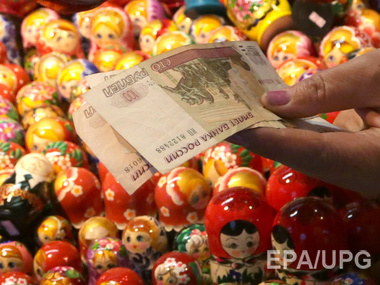Курс рубля к доллару вырос до 59,9 руб./$