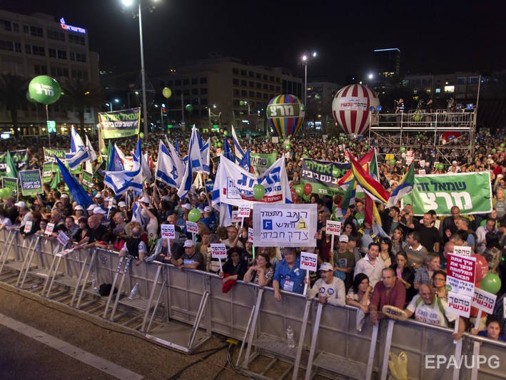 В Тель-Авиве прошла массовая акция против правительства Нетаньяху. Фоторепотаж