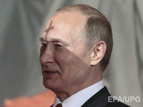 Крест на Путине и давка за бесплатным куличом. В России отпраздновали Пасху. Фоторепортаж