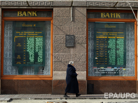 К закрытию межбанка гривна укрепилась до 21,4 грн/$