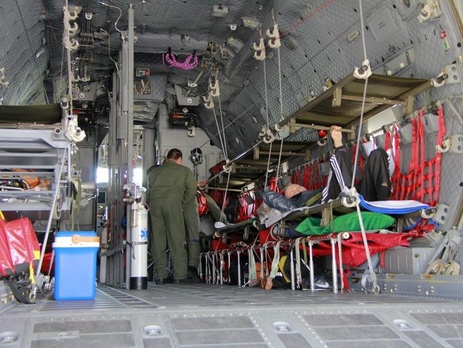 С военной площадки аэропорта Борисполь на лечение в Румынию отбыли 10 раненных украинских солдат. Фоторепортаж