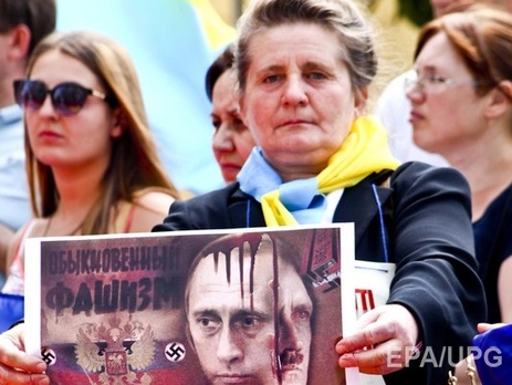 В Милане Путина встретили протестами. Фоторепортаж